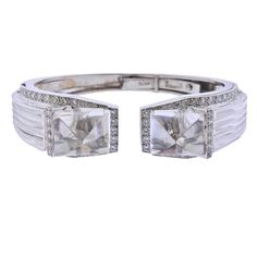 18k gold and platinum White Night cuff bracelet by David Webb, with carved rock crystal and approx. 1.70cts in H/VS-SI1 diamonds. DESIGNER: David Webb MATERIAL: 18k Gold / Platinum GEMSTONES: Diamond, Crystal DIMENSIONS: Cuff will fit approx. 6.75-7" wrist and is 5/8" wide at the widest point. MARKED/TESTED: David Webb, 18k, 900PT, ES506. WEIGHT: 58.1 grams CONDITION: Estate Formal Rose Cut Diamond Bracelets, Formal Bracelets With Rose Cut Diamonds, Formal Diamond Cuff Bracelet Fine Jewelry, Designer Diamond Cuff Bracelet Bangle, Designer Diamond Cuff Bangle Bracelet, Diamond Cuff Bracelet Bangle For Formal Occasions, Designer Bracelets With Single Cut Diamonds For Formal Occasions, Formal Cuff Bracelet With Brilliant Cut Diamond, Formal Diamond Cuff Bracelet With Brilliant Cut