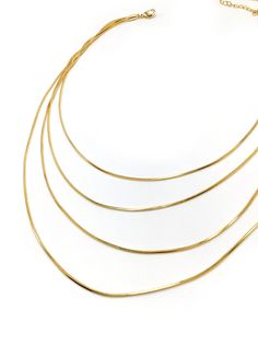 Four Layer Snake Chain Product Specifications: - Snake Layers Chains in Gold Filled 18K - Lobster Clasp - Hypoallergenic Layered Chains, Multi Strand Necklace, Strand Necklace, Multi Strand, Snake Chain, Gold Beads, Brown Gold, Lobster Clasp, Gold Filled