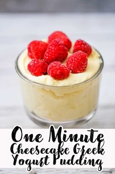 a small glass bowl filled with cheesecake and raspberries