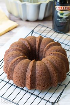 a bundt cake sitting on top of a cooling rack