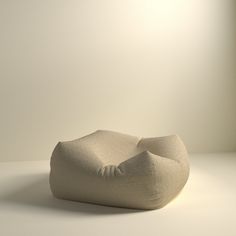 a white bean bag sitting on top of a table