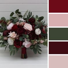 a bouquet of flowers sitting on top of a table next to a color swatch