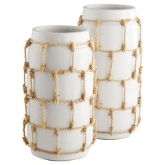 two white vases with rope wrapped around them