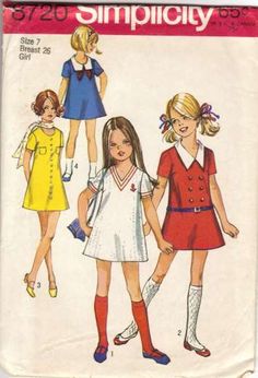 an old sewing pattern for girls'dress and shorts, with short sleeves and collars