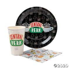 a black and white dinnerware set with the words central perk printed on it