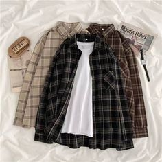 This shirt is perfect for those who are looking for a new shirt for a good price. It is fashionable, stylish, and it will look great on anyone who wears it. Do you wanahavit? Fall Outwear, Autumn Outwear, Plaid Shirt Women, Streetwear Mode, Plaid Shirts, Korean Fashion Casual, Moda Vintage, Vintage Plaid, Summer Fabrics