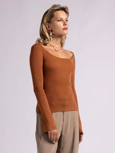 Style Description: U neckline Long-sleeved Ribbed fabric Measurements for a size small: Length: 21.5" Chest: 11.5" Sleeve Length: 25" Fabric Content/Care: 50% Viscose 44% Acrylic 6% Wool Machine Wash ColdImport Ribbed Square Neck Tops For Fall, Fitted Long Sleeve Scoop Neck Top For Fall, Ribbed Square Neck Fall Tops, Ribbed Square-neck Tops For Fall, Solid Color Fitted Knit Top For Fall, Square Neck Tops For Workwear In Fall, Fall Ribbed Neckline Fitted Knit Top, Fall Workwear Tops With Square Neck, Fitted Knit Top With Ribbed Neckline For Fall