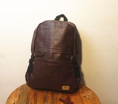 Material: PU
Texture: Soft
Closed: Zipper
Size: 16.5"L x 4.7"W x 11.4"H in; It is enough to hold daily stuffs including cell phones, sunglasses, wallet, key etc.
Baldric: Adjustable shoulder strap Trendy Brown Backpack With Zipper Pocket, Brown Shoulder Bag With Zipper For Back To School, Brown School Backpack With Zipper Pocket, School Backpack With Zipper Pocket In Brown, Brown Leather Backpack With Zipper Pocket For School, Brown Backpack With Zipper Pocket For On-the-go, Brown Rectangular Backpack With Zipper Pocket, Brown Bags With Zipper Pocket For Back To School, Brown Laptop Backpack With Zipper Closure