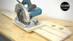 a circular saw is sitting on top of a wooden table