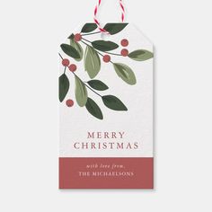 a christmas gift tag with holly branches and berries