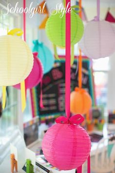 colorful paper lanterns hanging from the ceiling