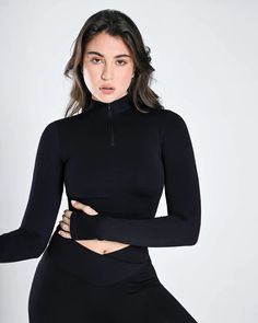 Seamless Half Zip Long Sleeve Top for Women | Cosmolle High Stretch High Neck Sporty Crop Top, Sporty High Neck Crop Top With High Stretch, Sporty High Neck High Stretch Crop Top, Functional Stretch High Neck Tops, High Stretch Black High Neck Crop Top, Stretch High Neck Crop Top For Sports, High Stretch Elastane Athleisure Crop Top, High Neck Stretch Crop Top For Sports, Stretch Half-zip Workout Top