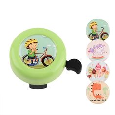 three magnets with different designs on them and one has a boy riding a bike