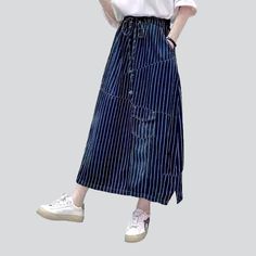 Be the envy of everyone in the 2023 Spring-Summer Collection with this stylish long denim skirt! With its distinctive vertical stripes and high-waisted fit. this skirt is sure to make a statement. Featuring a drawstrings closure. it's the perfect combination of comfort and flair. Whether you're headed to a music festival or a laid-back day out with friends. this skirt will become the crowning jewel of your outfit!Key Highlights: Street Style: This skirt is the perfect blend of contemporary fashi Striped Cotton Relaxed Skirt, Relaxed Striped Skirt For Spring, Casual Striped Cotton Skirt, High Waist Striped Summer Skirt, High Waist Striped Skirt For Summer, Summer High Waist Striped Skirt, Cotton Long Skirt With Drawstring, Casual Cotton Skirt With Vertical Stripes, Casual Striped Mini Skirt