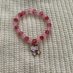 Pink And Red Flower Hello Kitty Charm Bracelet Preppy Beaded Bracelet Pink, Heart Bracelet Handmade, Hello Kitty Jewelry Bracelets, Trendy Pink Hello Kitty Jewelry, Playful Red Hypoallergenic Jewelry, Handmade Red Kawaii Jewelry, Playful Red Beaded Bracelets, Cute Red Bracelets For Valentine's Day, Cute Red Bracelet Jewelry