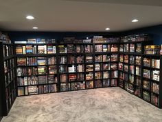 a room filled with lots of books and video games