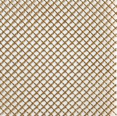 a close up view of a gold metal mesh