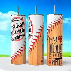 three baseball themed candles with the words my heart is on the field