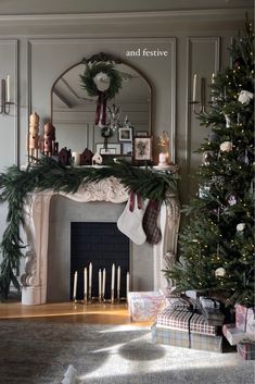 a living room with a christmas tree and fireplace