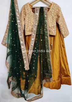 This is a made to order Lehenga Choli dupatta. I make it exclusively for my customers by using designer fabrics.I will only make it after you confirm your required size details.Handling time, don't worry, just tell me, I will process it accordingly and deliver on or before a delivery date you mention.Lehnga made with Tafta silk fabric.Blouse made with embroidered fabric.Dupatta is in Net with embroidery lace border on all sides of it. Dupatta is decorated with sequence work all over as shown in Semi-stitched Art Silk Lehenga With Self Design, Green Lehenga With Unstitched Blouse In Chinon, Festive Self-design Chinon Choli, Festive Chinon Choli With Self Design, Diwali Self-design Choli In Chinon, Diwali Chinon Choli, Diwali Self-design Chinon Choli, Fitted Chinon Choli With Zari Work, Kundan Dupatta For Reception