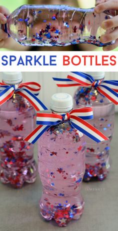 two bottles filled with pink liquid and red white and blue confetti on top