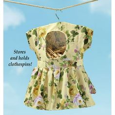 a dress hanging on a clothes line with the words store and holds clothing