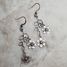 Leaf Branch With Tiny Flowers Earrings. Branch Charms Are Approximately 12x25mm. Comes On Stainless Steel Fish Hook Earrings. #Leaf #Flowers #Boho #Silver #Earrings Halloween Earrings Beaded, Boho Silver Earrings, Apple Earrings, Boho Hoop Earrings, Flowers Earrings, Bunny Earrings, Earring Ideas, Fish Hook Earrings, Handmade Jewelry Diy