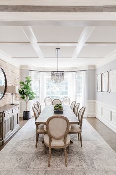 a large dining room table surrounded by chairs