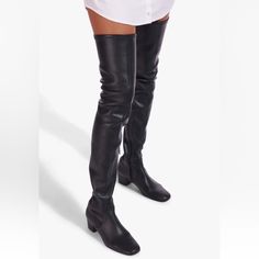 Staud -Condition: Brand New Item. -All Of Our Items Are 100% Authentic. -Does Not Include Box. -Size: Eu 36 (Fits True To Size). -Color: Black. -Model: Staud Aimee. -Pull On Over-The-Knee Boots. -Made Out Of Stretch Vegan Leather. -Heel Height: 40 Mm/1.6 In -Zip Fastening Along Side. -Polyurethane Upper. -Made In Italy. -Retails For $495.00 -Item Ships Out Within 24 Hours. Leather Square Toe Knee-high Boots For Night Out, Leather Knee-high Square Toe Boots For Night Out, Low Heel Faux Leather Heeled Boots Medium Width, Black Faux Leather Boots With Low Heel, Fitted Boots With Padded Low Heel, Fitted Black Knee-high Boots With Padded Heel, Black Leather Sole Knee-high Boots For Fall, Low Heel Faux Leather Boots For Work, Calf Leather Boots For Night Out In Fall