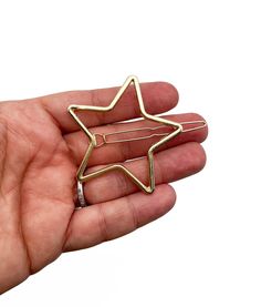 These gold plated star clips are big and bold and they are perfect for filling with resin to make customized hair clips.  You could also use them as they are too.  You will get 2 pieces so you can make a cute paired set.  They are 50x53mm and64mm long across the length of the clip. Gold Star Hair Accessories, Star Hair Slide, Cute Star Hair Clips, Star Hair Clip Beads, Gold Star Hair Clips, Gold Cost, Blank Hats, Star Hair, Uv Resin