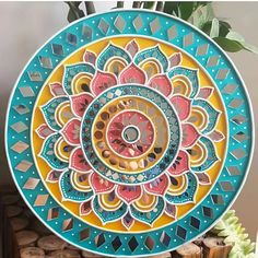 a colorful plate is hanging on the wall