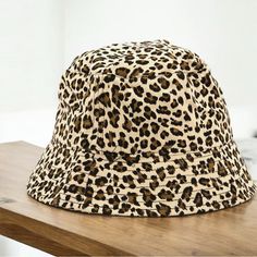 New Without Tags In Excellent Condition! Unleash Your Wild Side With This Olivia + Kate Animal Print Bucket Hat! Step Up Your Fashion Game With This Trendy Animal Print Bucket Hat! Perfect For Those Who Love To Make A Statement, This Hat Features A Classic Leopard Print Pattern In Shades Of Black, Brown, And Tan. The Bold Animal Print Adds A Touch Of The Exotic To Any Outfit. Crafted For Comfort And Durability, Ensuring It Lasts Through All Your Adventures. Ideal For Shielding Yourself From The Leopard Print Pattern, Shades Of Black, Print Pattern, Black Tan, Black And Tan, Step Up, Everyday Look, Fashion Games, Bucket Hat