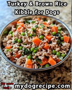 a bowl filled with rice, peas and carrots next to the words turkey and brown rice kibble for dogs