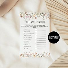 the price is right printable wedding game with flowers and leaves on white fabric background