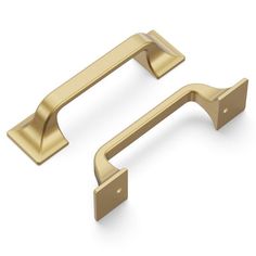 two brass handles on white background