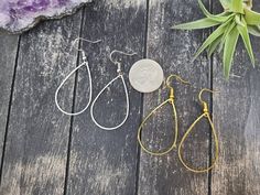 These super lightweight teardrop hoop earrings feature 40mm x 26mm brass open teardrops. Choose silver-plated or gold-plated! These minimalist geometric earrings will complement any outfit, and are lightweight enough for all day wear!The earrings measure 2.5 inches from the bottom of the teardrop to the top of the ear wires. The gold earrings have hypoallergenic gold-plated surgical steel ear wires, while the silver earrings have hypoallergenic surgical steel ear wires. These earrings are incred Metal Teardrop Drop Earrings As Gift, Everyday Metal Teardrop Earrings, Hypoallergenic Metal Drop Teardrop Earrings, Hypoallergenic Metal Teardrop Drop Earrings, Hypoallergenic Metal Teardrop Earrings, Everyday Metal Teardrop Drop Earrings, Adjustable Nickel-free Teardrop Earrings, Minimalist Teardrop Metal Hoop Earrings, Minimalist Metal Teardrop Hoop Earrings