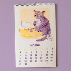 a calendar with a drawing of a cat sitting on top of a yellow boat and the date is march