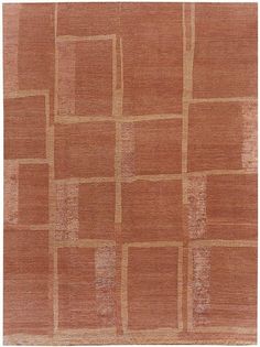 an orange rug with squares and rectangles on the top in various shades of brown