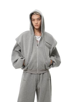 Experience the perfect blend of comfort and style with our Oversized Cropped Zip Hoodie and Wide-Leg Sweatpant Tracksuit Set.
Designed for a relaxed fit and crafted from high-quality fabric, this set ensures effortless ease and a contemporary edge. The hoodie features a cozy zip-up design and shoulder padding for an urban, structured look, paired with a stylish hood.
The wide-leg sweatpants complement the top with a fluid, fashion-forward silhouette. Together, they create a harmonious ensemble t Hoodie Layout, Grey Tracksuit, Wide Leg Sweatpants, Tracksuit Set, Urban Wear, Jogger Set, Grey Pants, Comfortable Outfits, Comfy Outfits