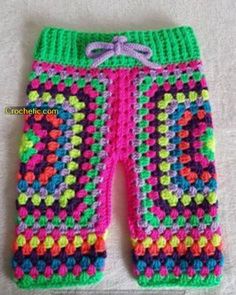 a crocheted pants with a bow on the side and colorful granny granny stitchs