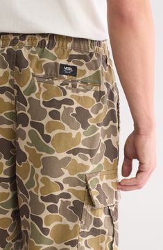 These baggy cargo pants are designed with a slightly tapered leg and styled with utility flap pockets for a signature laid-back look. Elastic/drawstring waist Front slant pockets; coin pocket; cargo flap-patch pockets 100% cotton Machine wash, tumble dry Imported Camouflage Relaxed Fit Utility Bottoms, Military Style Brown Bottoms With Pockets, Relaxed Fit Camouflage Bottoms With Cargo Pockets, Khaki Utility Cargo Shorts With Patch Pockets, Urban Camouflage Cargo Pants With Side Pockets, Casual Camouflage Cargo Jeans With Patch Pockets, Casual Camouflage Cargo Pants With Side Pockets, Camouflage Utility Bottoms With Patch Pockets, Cotton Combat Cargo Shorts