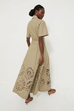 Founded in 2021 by designer Natasha Gordon, CLEA is a Melbourne-based premium womenswear label with a focus on timeless silhouettes and considered materials.Wow the crowd in the Pale Olive Green Annalise Shirt Dress. This sophisticated maxi is beautifully crafted in a linen-cotton blend with bespoke embroidery and a front button placket. The neutral light green makes this a perfect option for year-round wear, simply pair with heels or ballet flats and you are ready to go! Collar Short sleeves Pi Designer Cotton Spring Dresses, Designer Cotton Dresses For Spring, Designer Spring Midi Dress For Work, Designer Short Sleeve Spring Dress, Designer Spring Workwear Dresses, Designer Summer Midi Dress, Designer Dresses For Spring Workwear, Timeless Silhouettes, Embroidered Hem