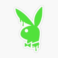 a green rabbit sticker with dripping paint on it