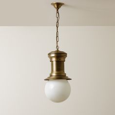 a light fixture hanging from a ceiling in a room