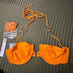 Nwt Small Monica Hansen Beachwear Orange Bikini Top. Halter Tie That Is Removable And Comes With An Extra Strap Without The Ring Detailing. Back Strap With Clasp Closure. Silver Ring Details. Sold At Revolve. Adjustable Orange Swimwear For Pool, Orange Underwire Swimwear For The Beach, Orange Bandeau Swimwear For The Beach, Orange Bandeau Swimwear For Beach, Top Halter, The Ring, Back Strap, Color Orange, Womens Swim