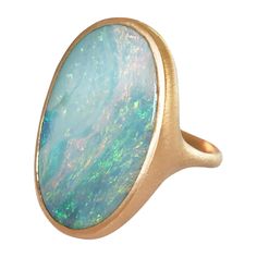 Dalben design 18k rose gold satin finishing ring with a 14,78 carat bezel-set oval light blue Australian Boulder Opal. The opal has pastel light blue-green colors with some pink waves. Ring size 7 1/4 - EU 55 re-sizable to most finger sizes. Bezel setting dimension: width 20 mm, height 27 mm. The ring has been designed and handcrafted in our atelier in Italy Como with a rigorous quality workmanship . Opal Rose Gold Ring, Rose Gold Satin, Color Stones Jewelry, Pastel Jewelry, Rose Gold Opal Ring, Ring Rosegold, Australian Boulder Opal, Light Blue Green, Australian Opal