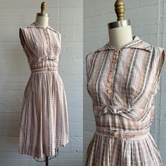 "1940s 40s Pink and Brown Textured Day Dress  This unique dress includes:  *textured fabric *matching covered belt *beautiful pink, brown, and white plaid *fabric belt loops *wide 40s collar Label: no tag Condition: Great vintage condition, minor signs of wear on belt buckle.  Size: Around a medium *please be sure to check measurements* Bust 36\" Waist 27\" Length 40\" Shoulders 14\" Belt 24.5-27\" * Thanks for looking! *" Fabric Matching, Adored Vintage, Belt Vintage, Brown Texture, Unique Dress, Vintage Wardrobe, 1940s Dresses, Pink And Brown, Plaid Fabric