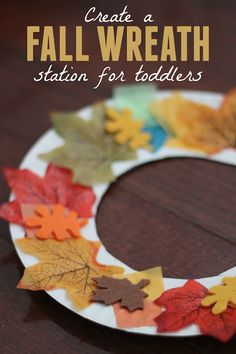 fall wreath station for toddlers made from paper plates and leaves with text overlay that reads create a fall wreath station for toddlers