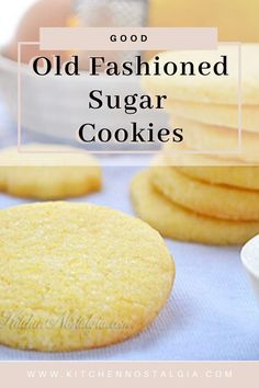 old fashioned sugar cookies on a blue tablecloth with text overlay that reads, good old fashioned sugar cookies