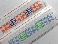 two cross stitch bookmarks with the word monogrammed in different colors on them